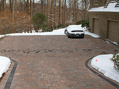 A heated brick paver driveway.