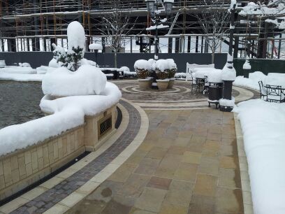 Snow melting system installed at outdoor mall.