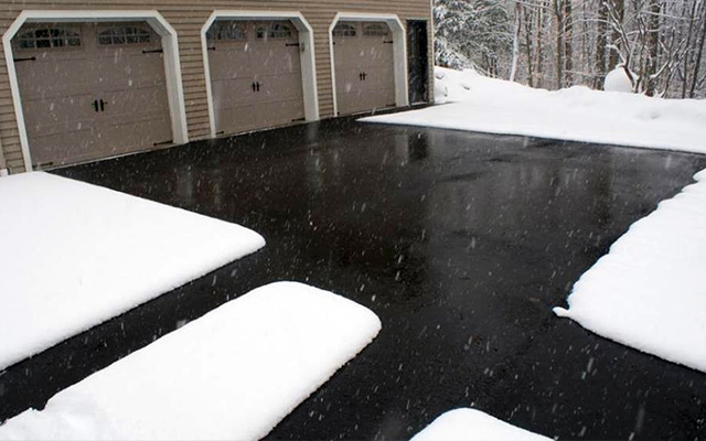 A heated driveway and walkways after a snowstorm.